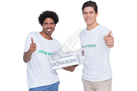 年轻微笑的青年志愿者募捐捐款捐赠社会男性帮助混血机构服务福利快乐男人背景图片