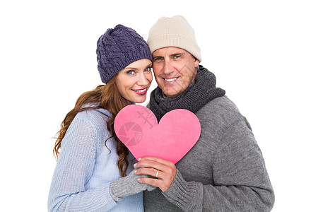 幸福的情侣 穿着温暖衣着 抱着心图片