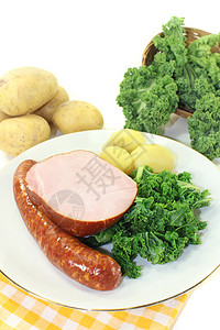 白叶土豆小便蔬菜食品烟熏市场香肠盘子用餐专业图片