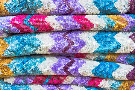 彩色的毛巾棕色纺织品紫色浴室洗澡粉色假期绿色白色蓝色图片