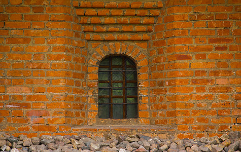 窗口特写的旧砖墙背景图片