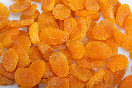 靠近一堆干杏仁小吃团体早餐厨房维生素甜点宏观食物橙子运动图片