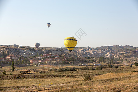 土耳其卡帕多西亚 卡帕多西亚最大的旅游景点 日出时气球飞行地标内夫景观岩石烟囱空气场景月球航班仙境图片
