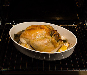 烤炉煮鸡肉烹饪食物晚餐迷迭香翅膀草药家禽饮食烤箱柠檬图片