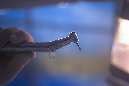 牙科口服牙医钻孔 清洁工具牙眼科医生激增摄影药品行动人手工作手术医学诊所操作保健图片