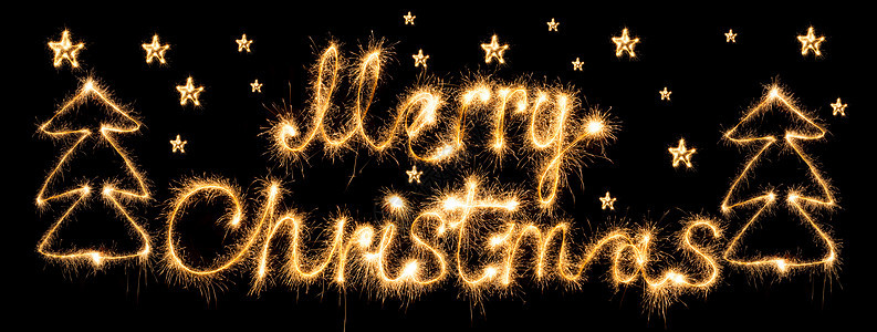 圣诞快乐 由黑色的火花制成纪念日橙子字母金子字体日历写作烟火打字稿焰火图片