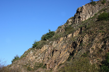山脉地景峡谷闲暇登山悬崖自由化森林蓝色天空自然界图片