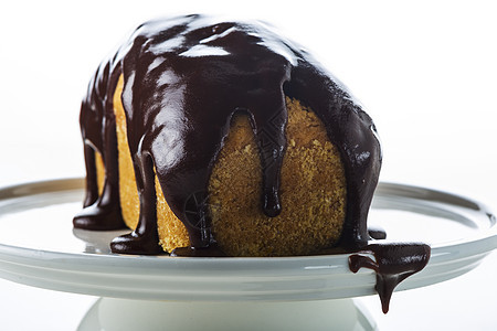 小巧克力蛋糕棕色盘子派对刨冰液体香草蛋糕糕点巧克力糖浆图片