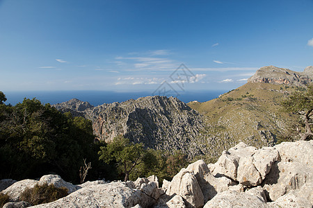 西班牙马略卡岛的山脉薄雾风景旅游天空衬套海岸高度顶峰岩石旅行图片