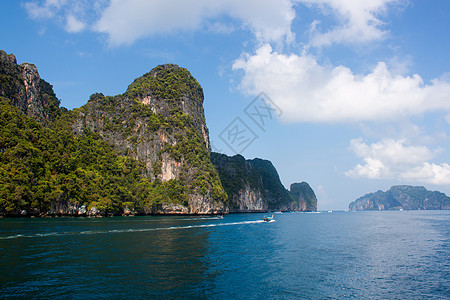 泰国金沙岛泰国Phi Phi Leh岛旅行天堂海浪风景太阳热带海洋天空岩石海岸背景