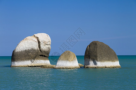 海洋和石头场景太阳热带旅游支撑日落岩石天堂海岸线海滩图片