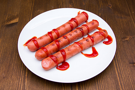 香肠和木头加番茄酱图片