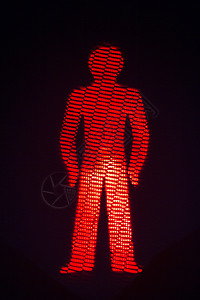 红色男子行人停止交通灯背景紧迫感灯光设备媒体红绿灯黑色男士信息路口图片