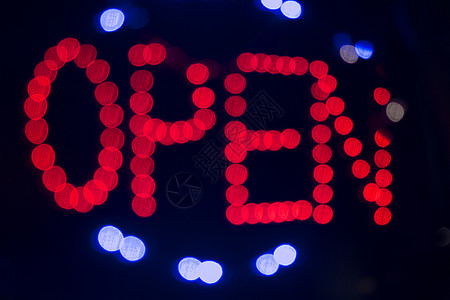 霓虹字夜里亮亮的标志餐厅红色营销窗户霓虹色入口灯光设备一个字蓝色背景