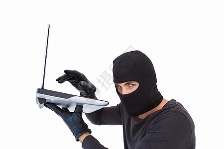 重点盗贼侵入笔记本电脑男人网络刑事专注犯罪手套骇客技术男性图片