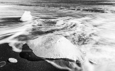 带冰山的海滩支撑水晶冰川海岸波浪冲浪海洋冻结山脉天空图片