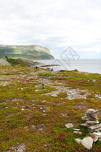 挪威北部地貌景观峡湾海岸线地平线海洋海滩草地天空海岸旅行场景图片