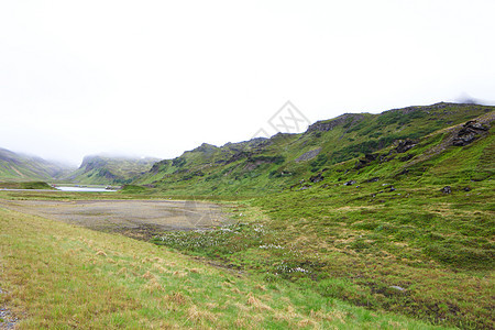 挪威山丘苔原山脉城市渡船绿色爬坡天空土地天气风景图片