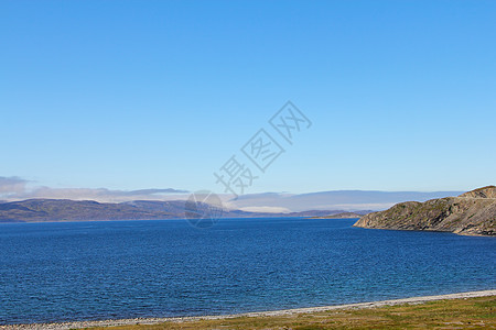 挪威的Fjord蓝色悬崖岩石苔藓场景生态环境天空阳光苔原图片