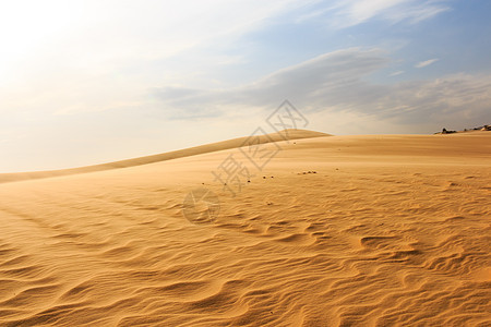 沙漠的波浪灰尘小丘脱水场景橙子蓝色产量土地爬坡环境图片