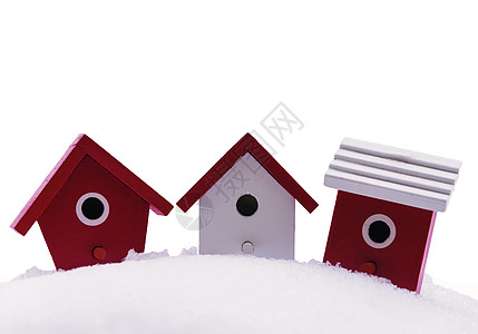 下雪的三座小鸟屋图片