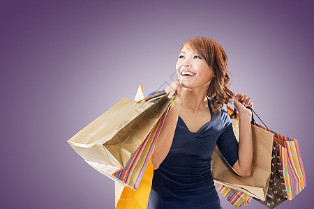 愉快的购物妇女喜悦购物者销售快乐礼物消费者幸福顾客女性购物中心图片