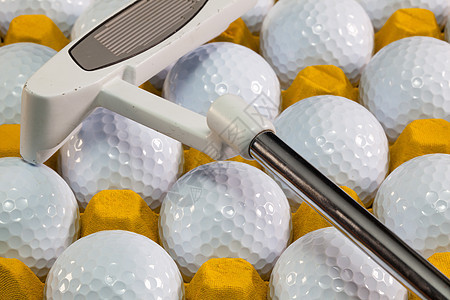 黄色盒子和高尔夫球的白色高尔夫球乐趣球座推杆闲暇爱好运动图片