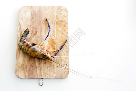 白木桌板上砍板上的虎虾桌子毛巾老虎白色食物贝类甲壳盘子美食动物图片