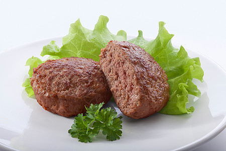 肉片类油炸美食隔断盘子香菜食物绿色背景图片