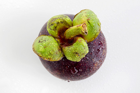 芒果白色热带气候水果甜食紫色背景图片