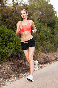 青年运动女运动员跑步者户外远距离训练越野跑步女性锻炼女士短跑慢跑者赛跑者背景图片