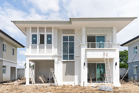 在建房屋与建筑设备脚手架工作建造住房蓝色白色框架财产房子天空图片