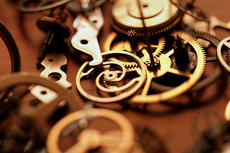 时钟小部分机械钟表金属宏观古董发条维修装置车轮时间图片