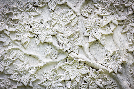 带有花朵纹理的白色灰泥工艺寺庙艺术装饰叶子浮雕石膏风格雕刻传统背景图片