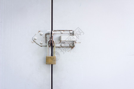 有锁的金属门秘密划痕房子监狱黑色出口隐私建筑工业入口图片