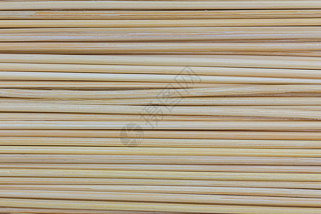 竹垫背景的特写风格材料条纹小地毯木头柳条文化植物带子宏观图片