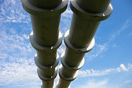 输油管高端部分供水气体温暖渡槽管子送货蓝色天空金属基础设施图片