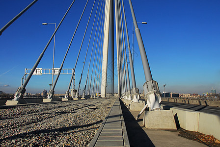 贝尔格莱德的Ada桥碎石小路灰色阳光建筑物金属运输天空日光建造图片