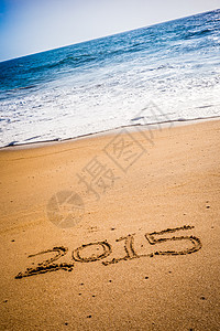 2015年被刻在沙滩上的沙子中海洋数字工作相机写作假期天堂冲浪决议海滩图片