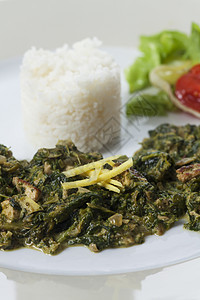 与巴斯马提的印度菠菜咖哩食物烹饪芝士美食香料蔬菜午餐小屋香米沙拉图片