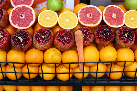 水果摊石榴市场展示摊位橙子热带火鸡食物红色商业图片