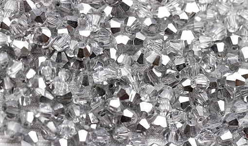 玻璃珠玻璃珠宝首饰白色宏观钻孔奢华水晶宝石背景图片