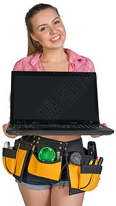工具带显示妇女用空白屏幕打开笔记本电脑微笑建造维修硬件工作工作室劳动衬衫牛仔裤键盘图片