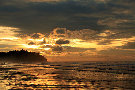 日落海滩水平旅行目的地场景旅游海岸线脚印热带商务图片