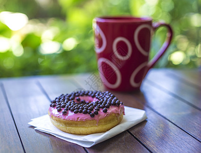 美味的甜甜圈煎饼早餐垃圾咖啡奶油食物蛋糕巧克力桌子飞碟图片