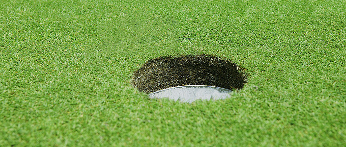 高尔夫球洞游戏圆形休闲概念娱乐绿色竞赛课程运动宏观图片