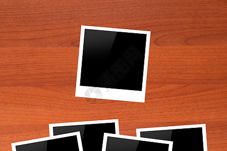 Wooden 表格上的空白图片框架摄影黑色记忆小样剪贴簿乡愁木头相机卡片拍摄图片
