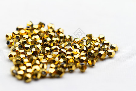 金色玻璃珠珠首饰钻孔水晶奢华珠宝宏观黄色宝石白色图片
