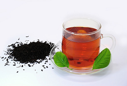 一杯茶黑色液体工作室白色饮料棕色玻璃叶子早餐茶碗图片