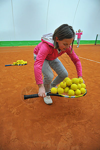 网球学校运动员女孩球拍活力活动黄色童年青年孩子玩家背景图片